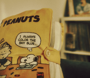 Vintage Peanuts notebook featuring Snoopy and Charlie Brown, illustrating the enduring appeal of the Peanuts brand following Sony’s majority acquisition.