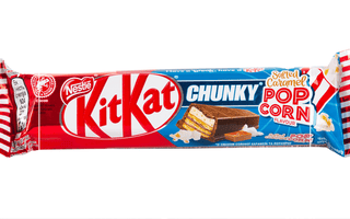 KitKat Chunky Salted Caramel Popcorn flavour bar in its colourful red, blue and white packaging, highlighting Nestlé’s bold and creative limited-edition flavour innovations.