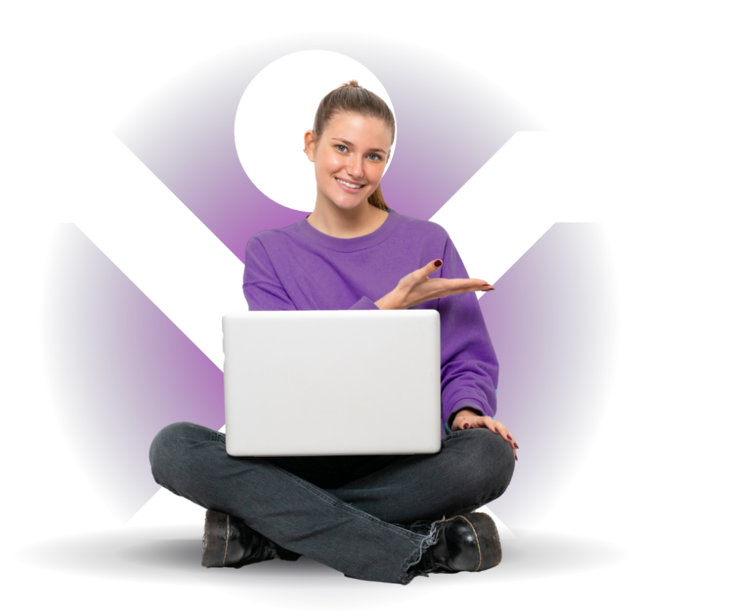 A student sat crossed legged with their laptop on their lap smiling whilst doing their online premium CIMA course.