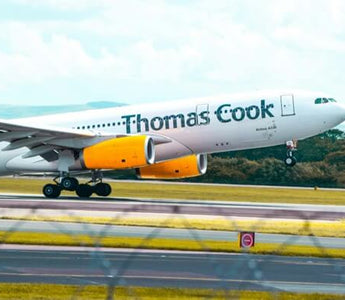 Thomas Cook aircraft taking off, illustrating the collapse of the travel company due to cash flow pressures.