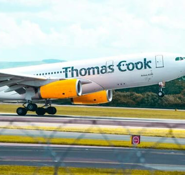 Thomas Cook aircraft taking off, illustrating the collapse of the travel company due to cash flow pressures.