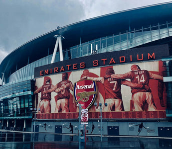 Arsenal’s Emirates Stadium in London, symbolising team identity and rivalry, referenced in a discussion on culture fit and recruitment decisions in the workplace.