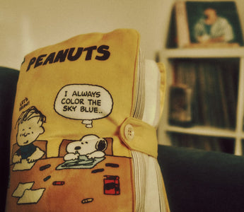 Vintage Peanuts notebook featuring Snoopy and Charlie Brown, illustrating the enduring appeal of the Peanuts brand following Sony’s majority acquisition.