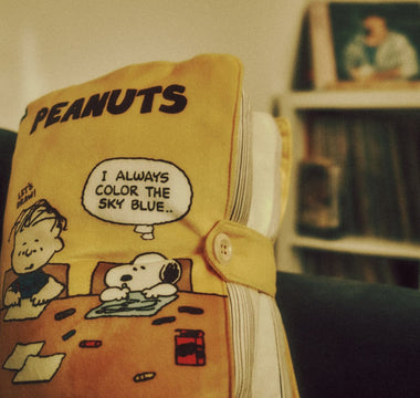 Vintage Peanuts notebook featuring Snoopy and Charlie Brown, illustrating the enduring appeal of the Peanuts brand following Sony’s majority acquisition.
