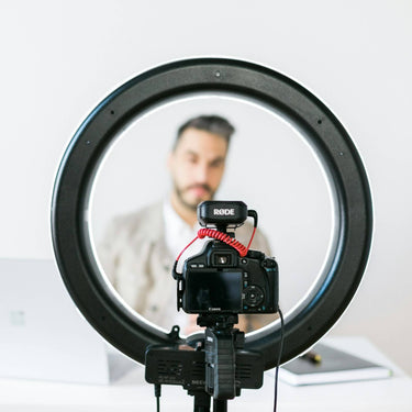 Digital creator working on a laptop, symbolising ExP Digital Ambassadors promoting courses online.