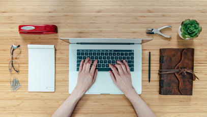 Learner using ExP’s NextGen online learning platform on a laptop, highlighting AI-powered tools and interactive learning features.
