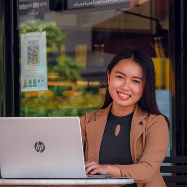 Student studying online on a laptop, symbolising ExP Student Ambassadors inspiring peers to learn.
